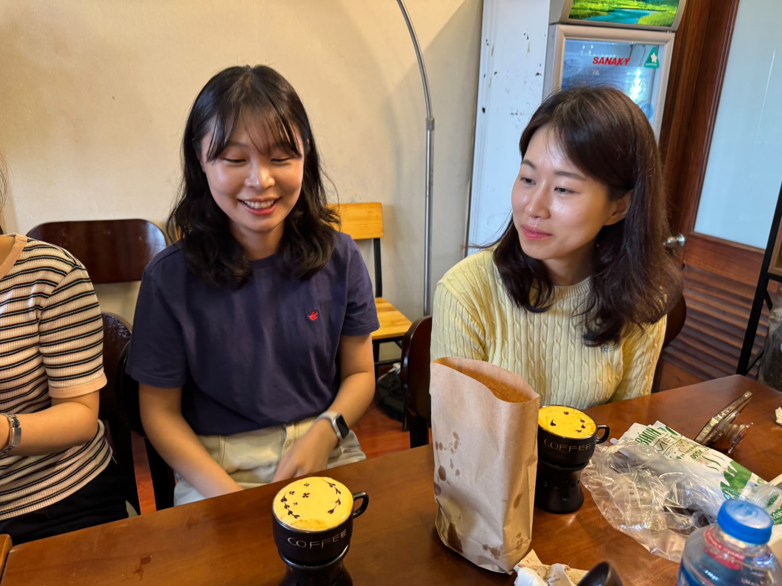 Happy guests enjoying egg coffee