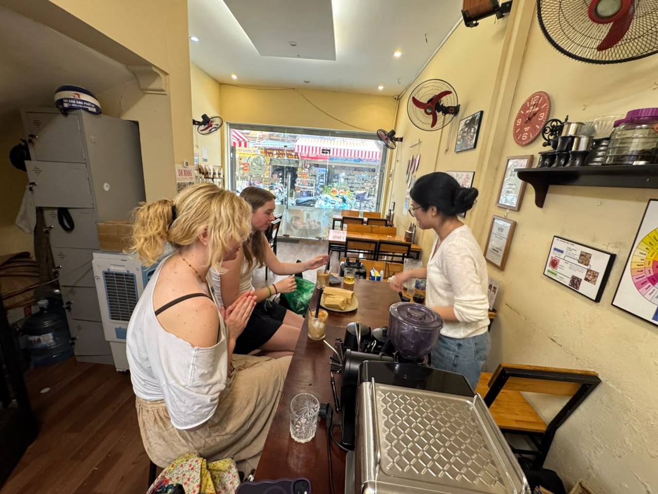 Guests at the Hanoi Egg Coffee counter
